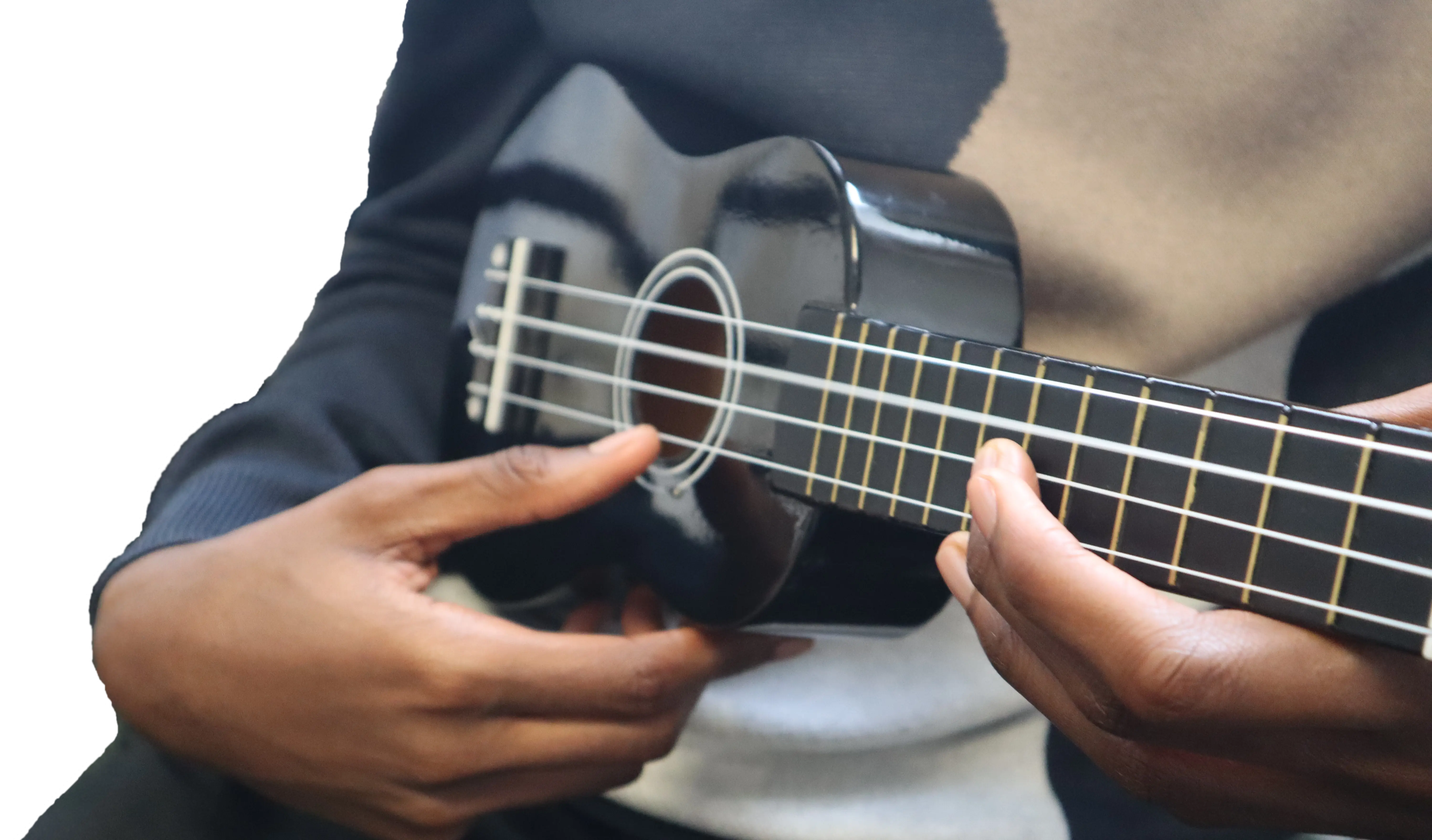 An image of children in a band, having fun during their music tuition in grays.